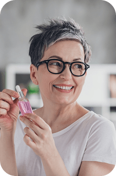 Woman holding vial