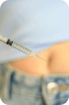 Woman holding vial